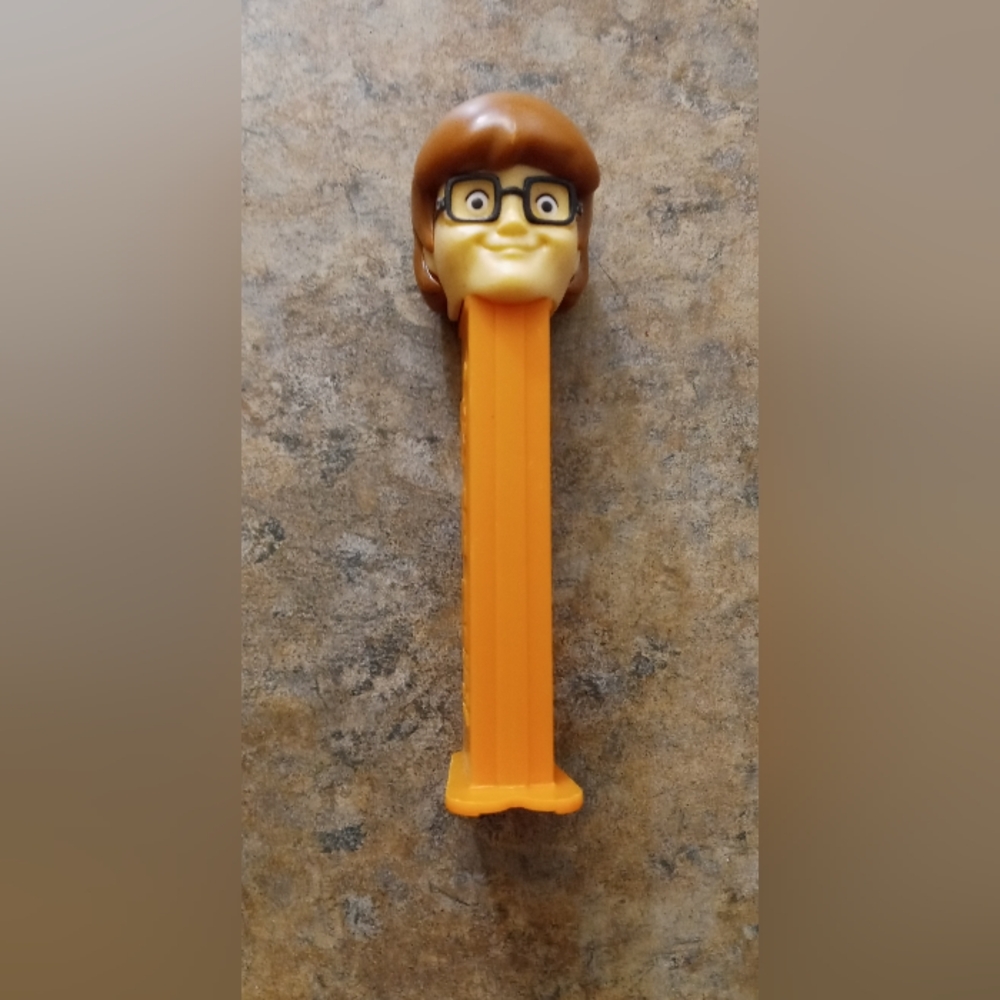 Velma Scooby do PEZ Candy Dispenser - Orange Stem